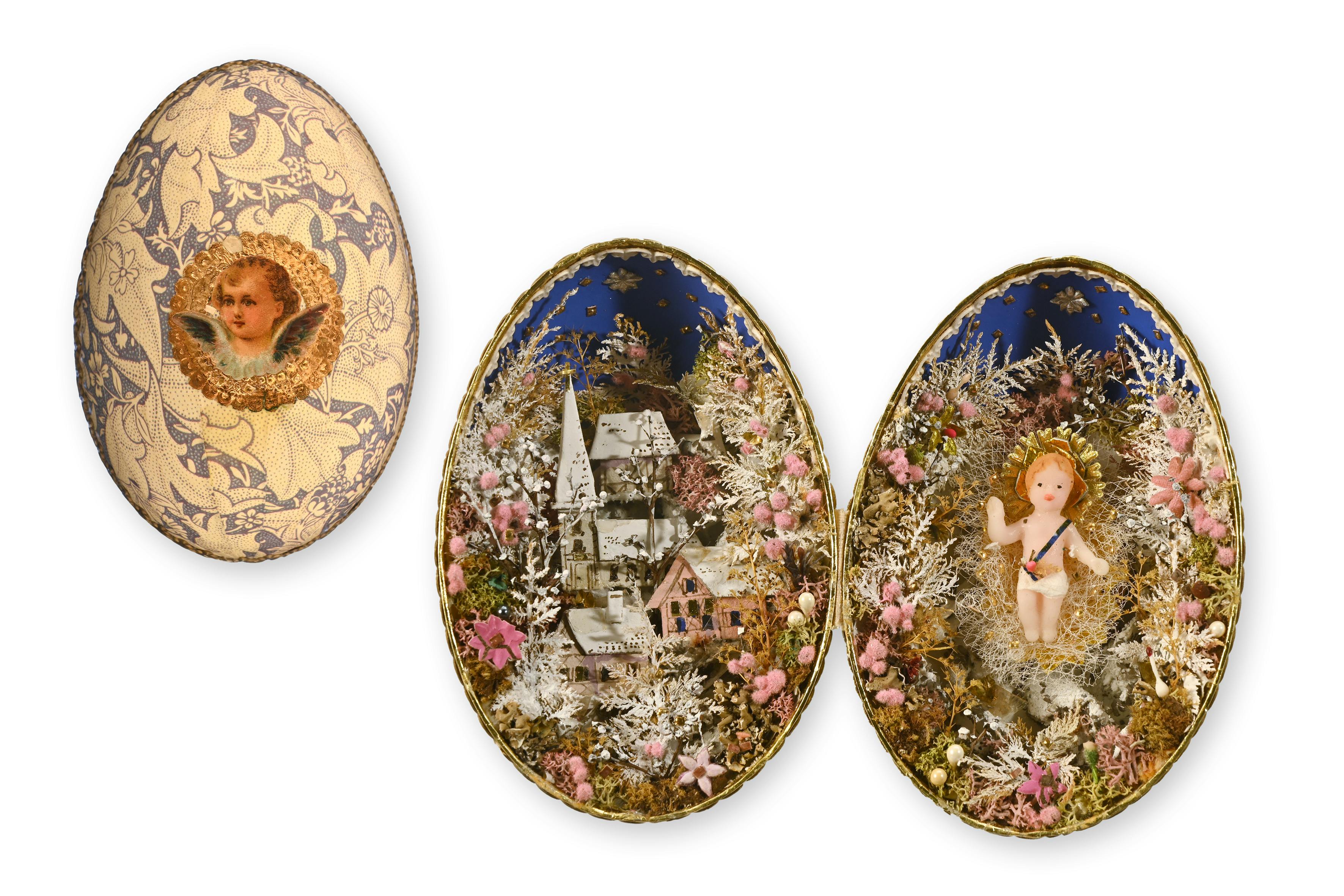 Gänseei aufgeschnitten, Collage, im Inneren: Winterlandschaft und Jesuskind aus verschiedenen Materialien, Gitta Schuoler, Schweiz, 1987