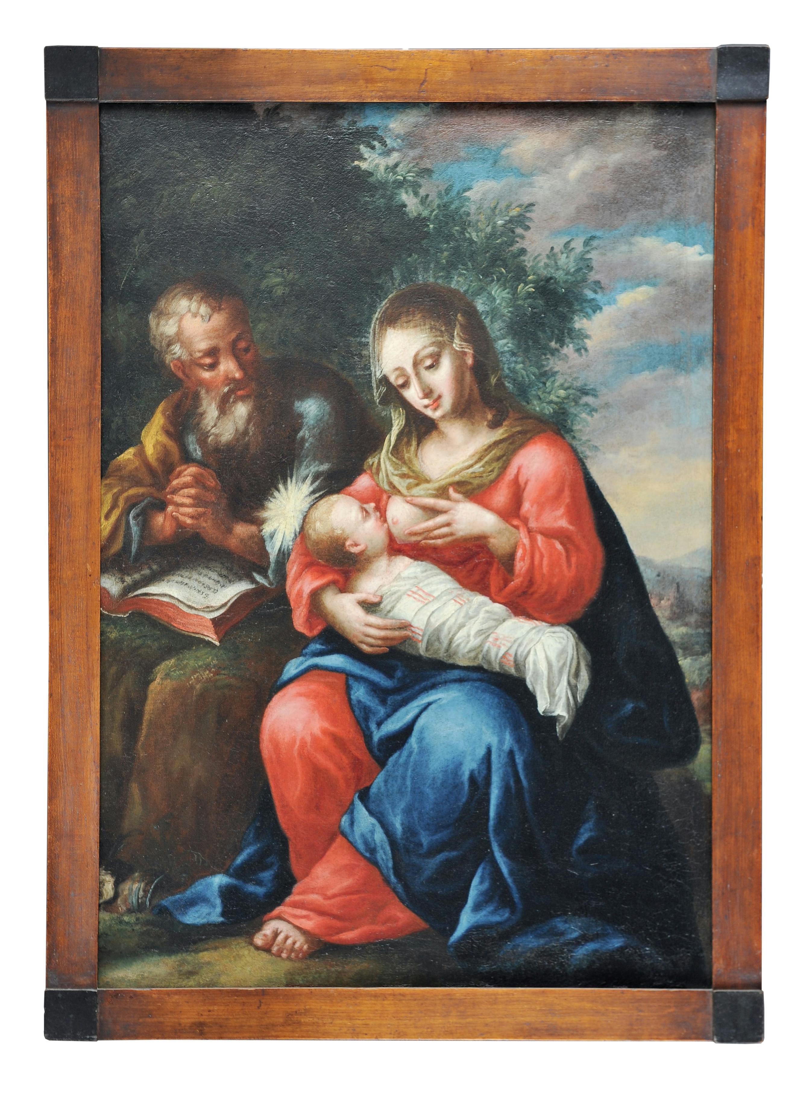 Die heilige Familie in einer Landschaft.